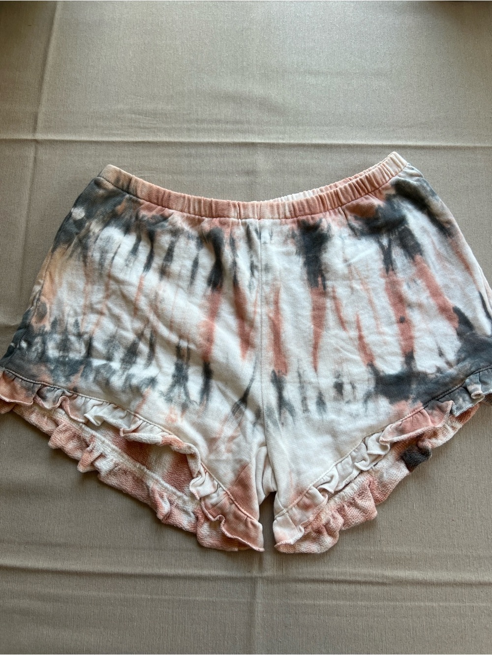 POL Tie-Dye Ruffle Hem Lounge Shorts in Peach, Black & White
